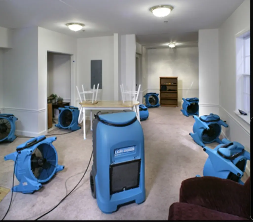 Air movers and dehumidifier setup for Water Damage Restoration in Alvin